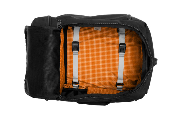 An open Techonaut 45 with a Black exterior and a Zest (orange) interior.